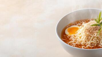 Close-up of a bowl of instant ramen noodles with an egg yolk, broth, and fresh herbs on a light textured surface, showcasing delicious prepared ramen soup photo