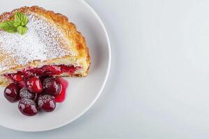 Sweet Cherry Pie Slice on White Plate photo