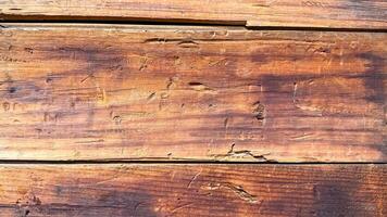 Sunlit rustic wooden planks, storytelling in grain patterns, evoke medieval craftsmanship for Lughnasadh feast or cabin coziness photo