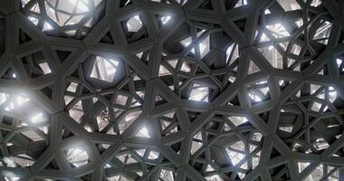 Abu Dhabi, UAE, 2025 - Close up of the openwork dome of the Louvre Dubai. The camera is spinning, the pattern resembles a kaleidoscope photo