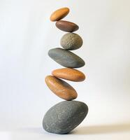 Balanced stones in a delicate stack photo