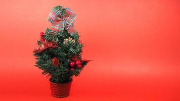 christmas tree over with red background photo
