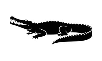 Silhouette illustration of a powerful alligator with open jaws in black and white vector