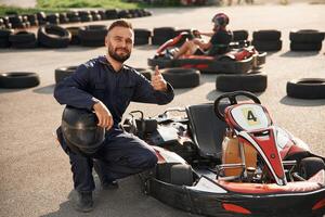 Man is outdoors,, kart ,racing,, conception photo