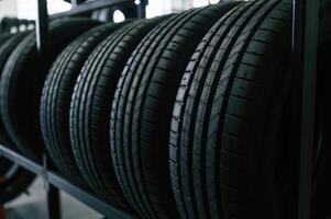 In the ,right, order. New tires are ,placed on the storage rack in the car workshop photo