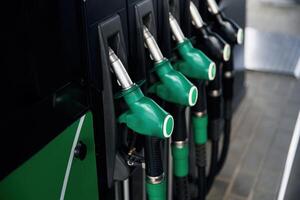 Close up view of ,various,, gas pump nozzles photo