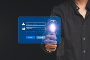 Log in to the system with a fingerprint on the virtual screen while standing on a black background photo