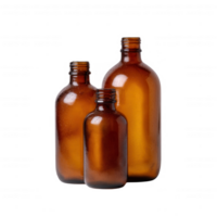 Three amber glass bottles of varying sizes arranged together, showcasing their unique shapes and muted colors, perfect for use in beverage or packaging designs. png