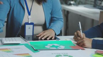 A woman and man are working on a project together video