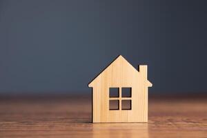 A small wooden house on a table photo