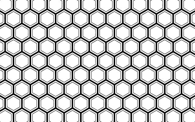 Geometric seamless black and white honeycomb pattern for backgrounds and design elements