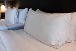 Close up of white pillow twin bed photo