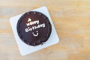 A chocolate birthday cake with a message on it photo