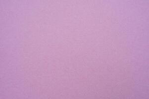 Full frame shot of pink paper sheet texture and background. photo