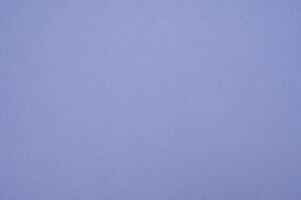 Full frame shot of purple paper sheet texture and background. photo