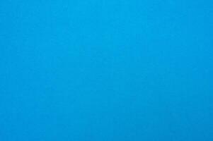 Surface of light blue paper sheet texture and background. photo