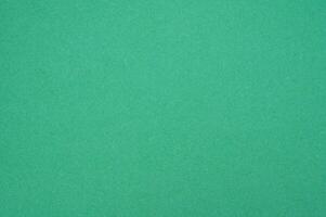 The surface of light green paper sheet texture and background. photo