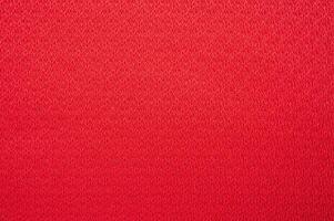 Full frame shot of red polyester cloth texture and background. photo