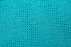 Full frame shot of light green polyester cloth texture and background. photo