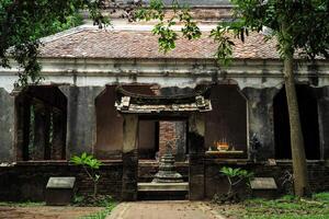 The old Buddhism church located in the forest photo