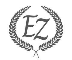 Initial letter E and Z, EZ monogram logo design with laurel wreath. Luxury calligraphy font. vector