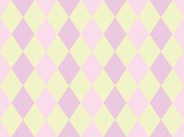 Delightful pastel pink and yellow argyle pattern. Perfect for backgrounds, website design, branding, or feminine projects. vector