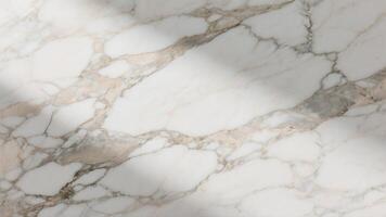 High-resolution beige marble stone texture with natural grain patterns. Ideal for use in interior design, architecture, product backdrops, and digital design projects photo