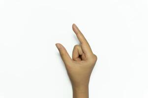 Woman's hands holding empty. woman's hand showing size with fingers. photo