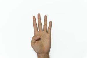 Hand finger sign number 4 isolated on white background. photo