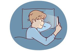Boy with phone licks in bed and watches movie with smile or plays game refusing vector