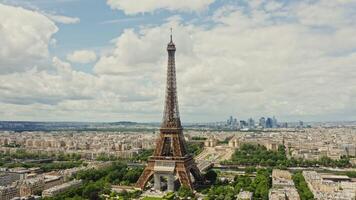 Close up of the Eiffel Tower during restoration. Bird's eye view from a drone on a cloudy day, Paris, France photo