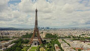 Drone horizontal panning view of the historic center of Paris with the Eiffel Tower in the foreground on a summer day. France Paris photo
