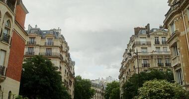 Beautiful panoramic view of a street in the historic center of Paris with traditional houses in the original style. France Paris. 4k , red komodo photo