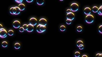 Colorful Iridescent Soap Bubbles Floating on a Black Background - Abstract Animation Loop video