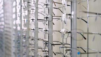 Eyeglasses display rotating in optical store video
