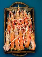 Fresh crayfish roasted using the rustic method isolated photo