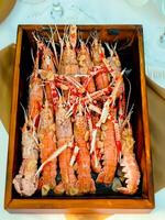 Fresh crayfish roasted using the rustic method wild photo