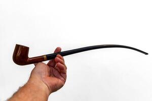 Hand holding luxurious pipe in selective focus and smooth background 3 photo