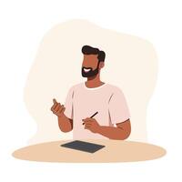 A man is doing creative design work with gadget on the table vector