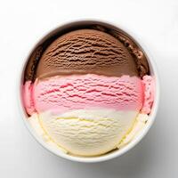 An ice cream bowl with three different colors of ice cream photo