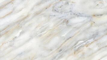 White marble surface with light gray waves and natural crystal texture photo