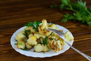 Vegetable dish of fried cabbage with aromatic spices. photo