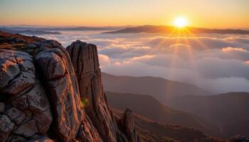 a cliff face overlooking a fog covered valley, with the sunrise casting golden hues onto jagged rock. photo