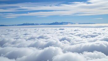 a plateau above the clouds, where only mountain peaks pierce the white sea below. photo