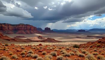 a red rock desert under dramatic cloud cover, shadows shifting quickly over the arid ground. photo