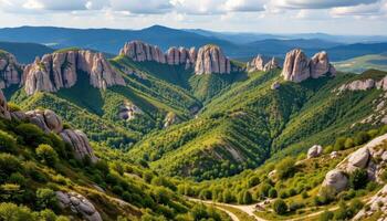 a karst landscape dotted with sinkholes, caves, and limestone spires, partially covered in green. photo
