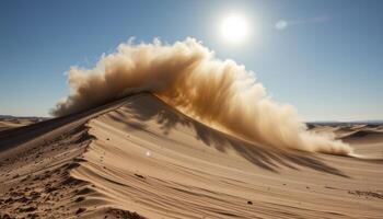 a lonely desert wind funnel spiraling across the sand, trailing a plume of dust under a white hot sun. photo
