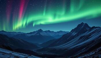 a distant chain of jagged mountains lit only by starlight and the faint aurora above. photo