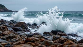 a rocky coastline with crashing waves under an overcast sky, sea spray filling the air. photo
