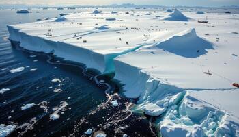 ice shelf breaking off into deep polar waters photo